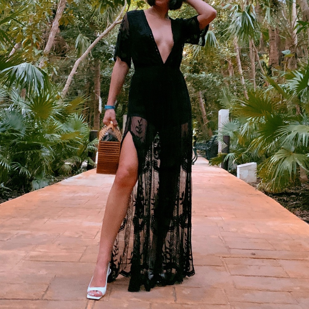Long black lacy dress with high-slit
